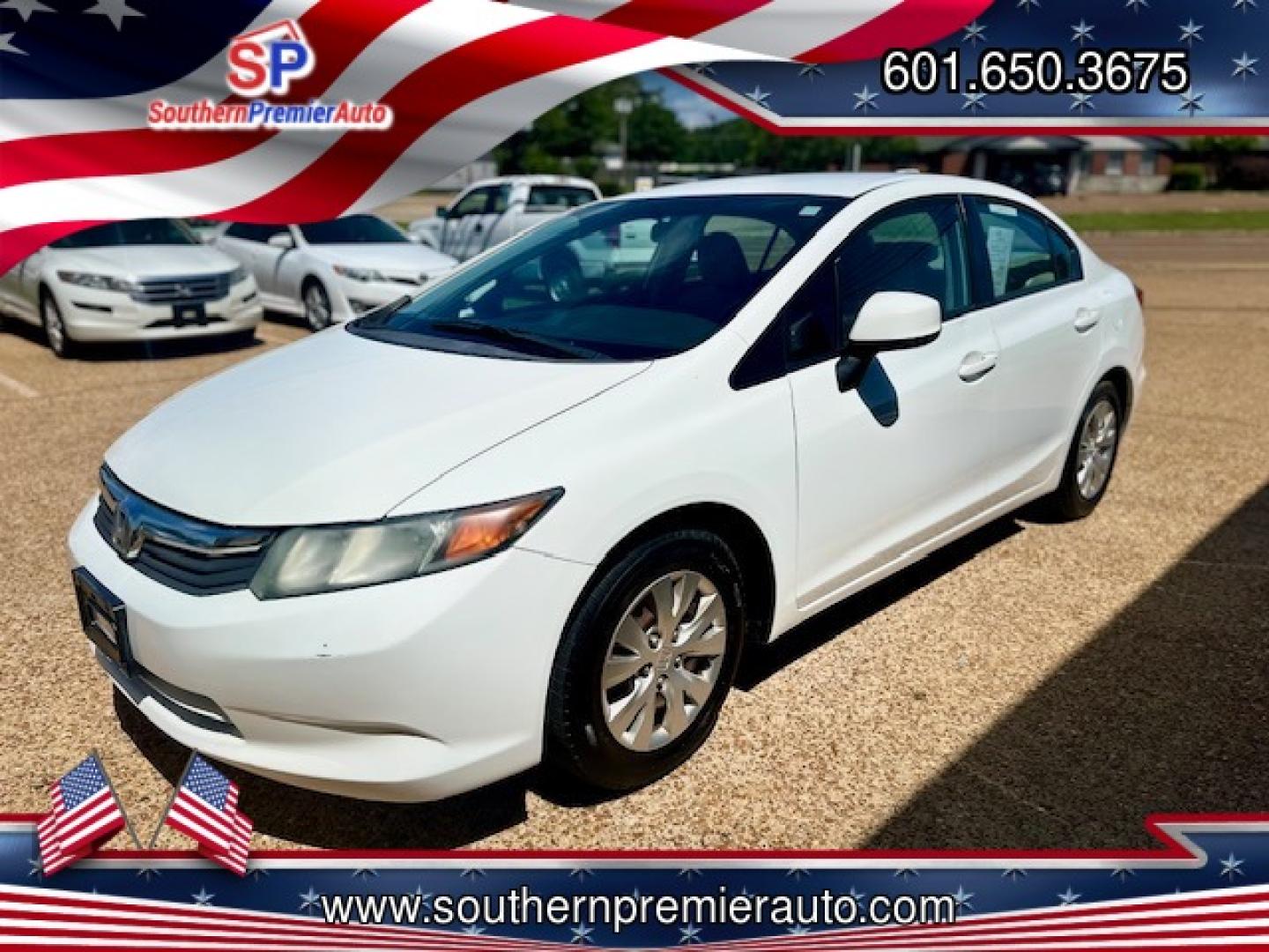 2012 WHITE HONDA CIVIC LX LX (2HGFB2F51CH) with an 1.8L L4 SOHC 16V engine, 5-Speed Automatic transmission, located at 922 W. Beacon St., Philadelphia, MS, 39350, (601) 650-3675, 32.770447, -89.127151 - Title: 2012 Honda Civic LX Sedan Year: 2012 Make: Honda Model: Civic Engine: 1.8L L4 SOHC 16V Body: SEDAN 4-DR Transmission: 5-Speed Automatic Drive Type: FWD Mpg City: 28 Mpg: 39 Trim: LX Sedan - Photo#2